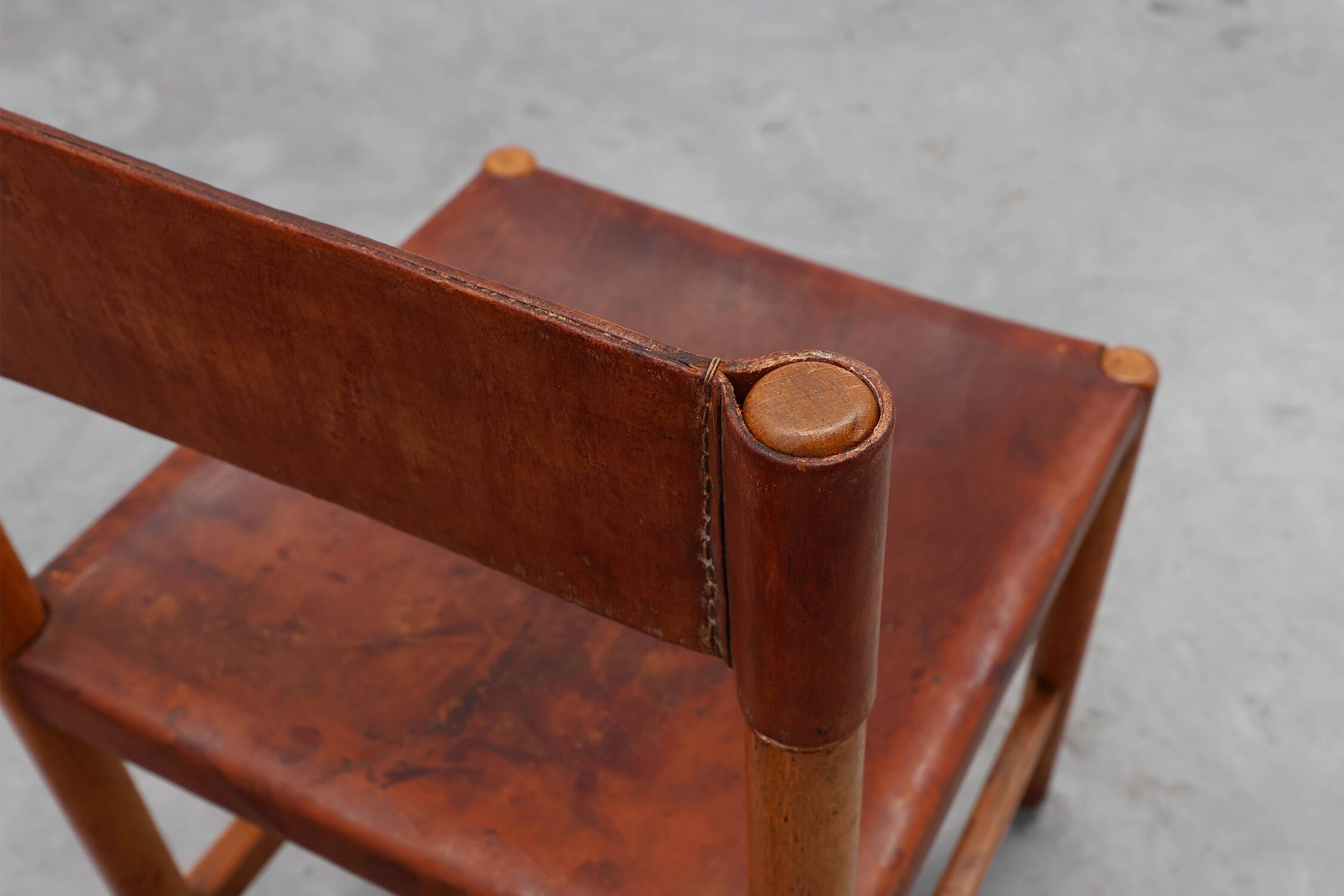 Pair of wood and leather Spanish chairs by Jordi Vilanova, ca. 1960