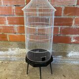 Antique black & white metal bird cage on vintage decorative legs
