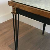 Patinated and gilded steel coffee table in the style of Jacques Quinet.