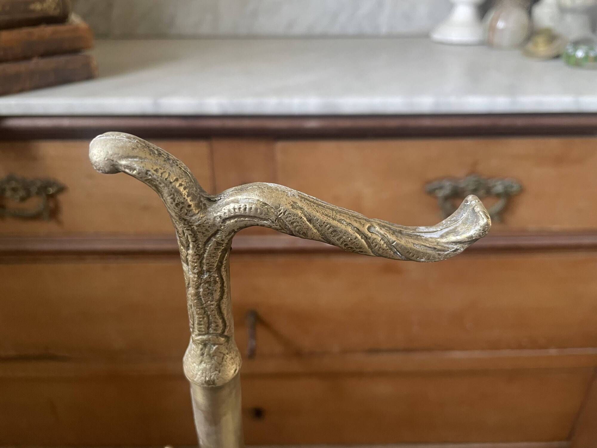 Antique repoussé brass umbrella stand