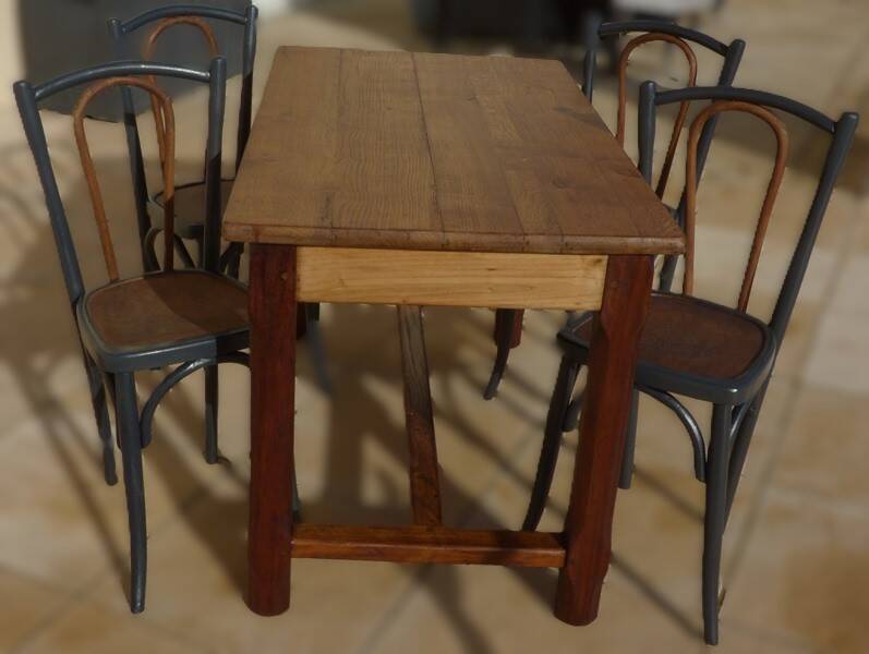 Oak farmhouse table with legs joined by a spacer