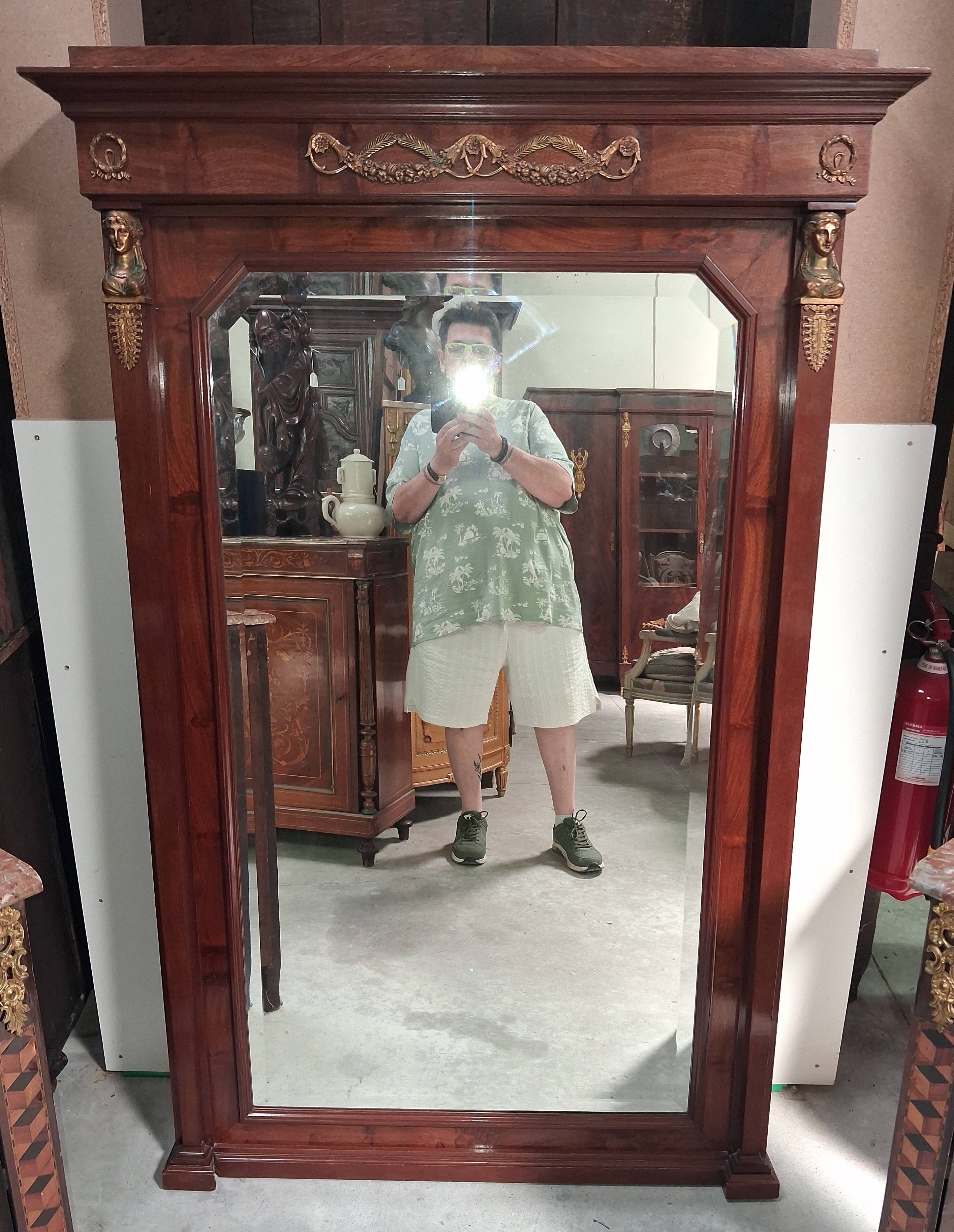 Large Empire-style mahogany mirror – Mercury-gilded bronzes –