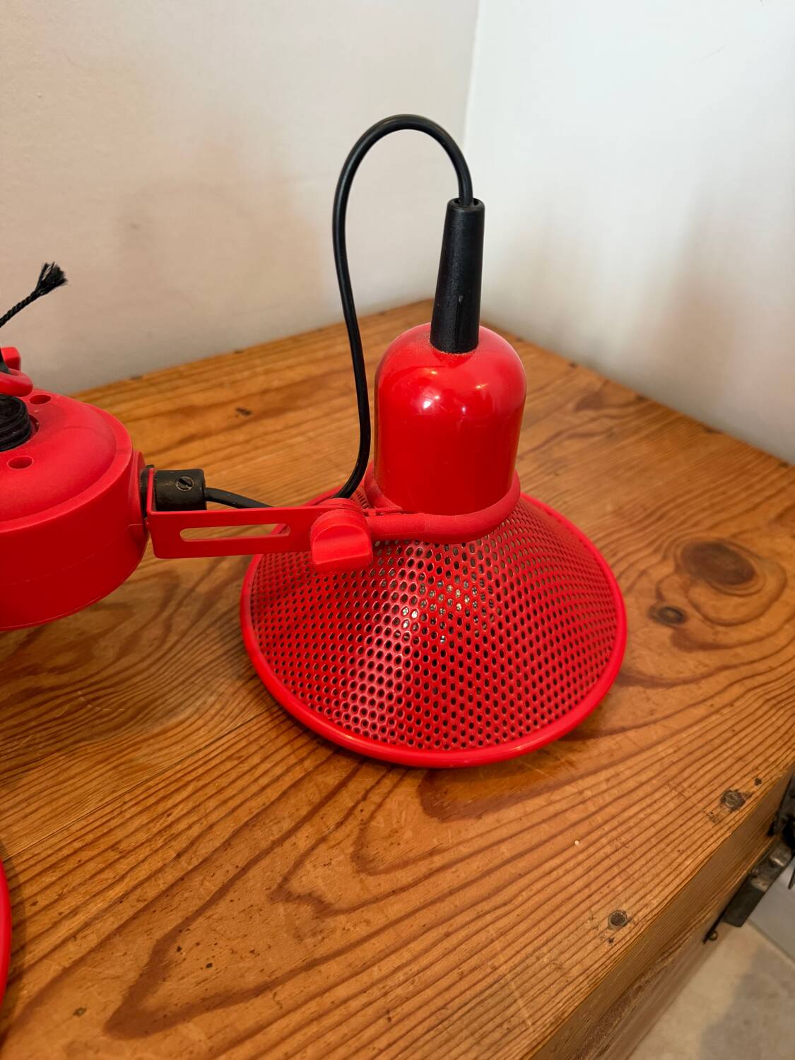 Three-lamp suspension in Memphis design style in red metal.