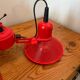 Three-lamp suspension in Memphis design style in red metal.