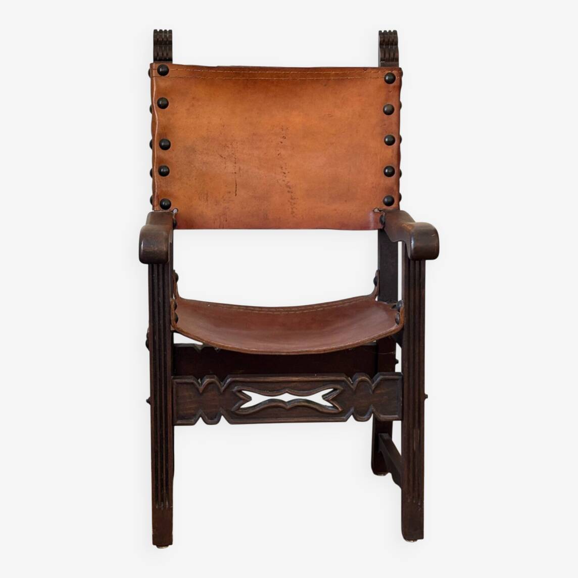 Frailero armchair, antique Spanish — carved wood & full-grain leather throne.