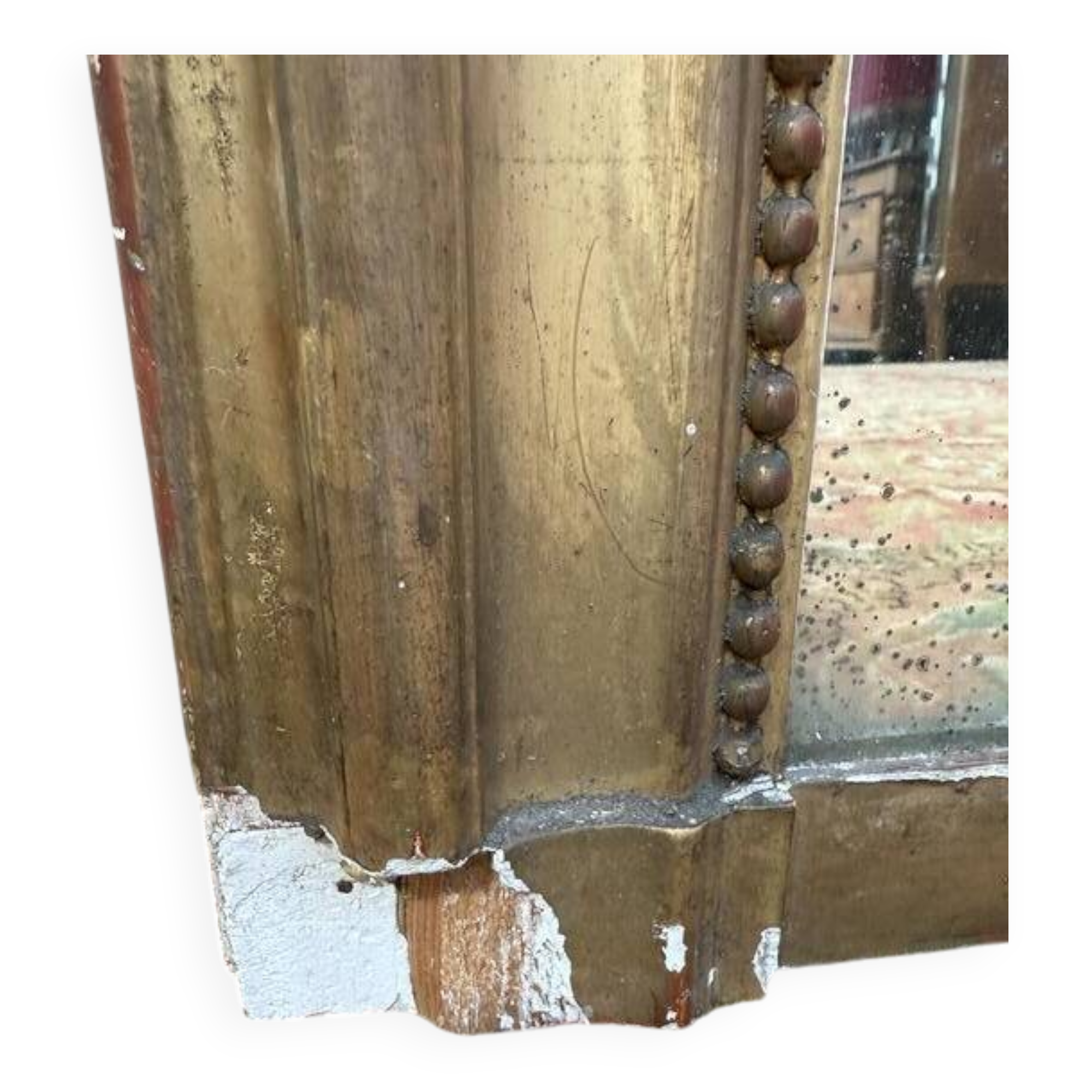 Miroir époque Louis Philippe à la feuille d'or.