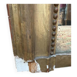 Miroir époque Louis Philippe à la feuille d'or.