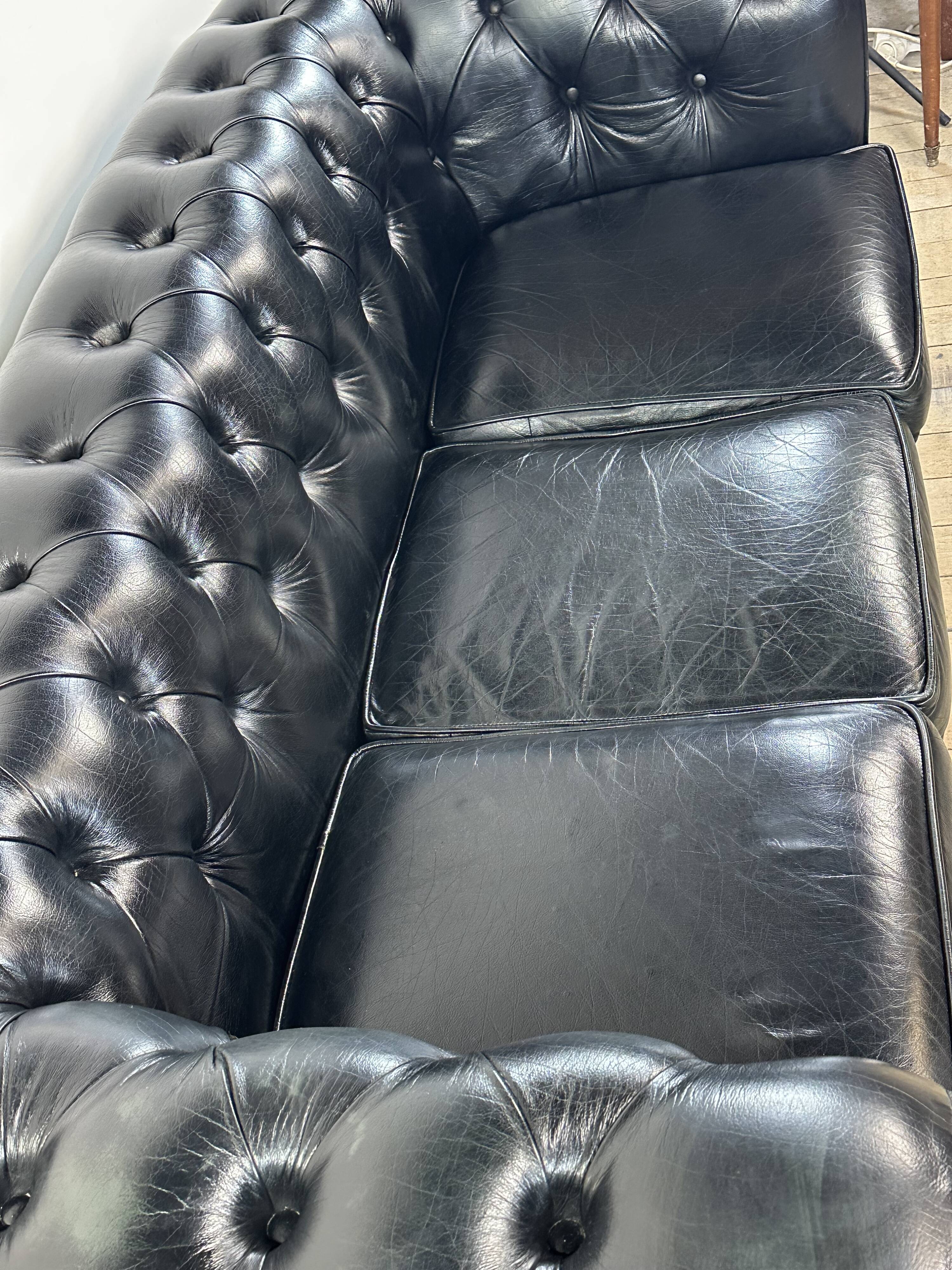 Vintage 1980 black leather Chesterfield sofa