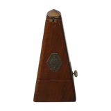 Old wooden metronome