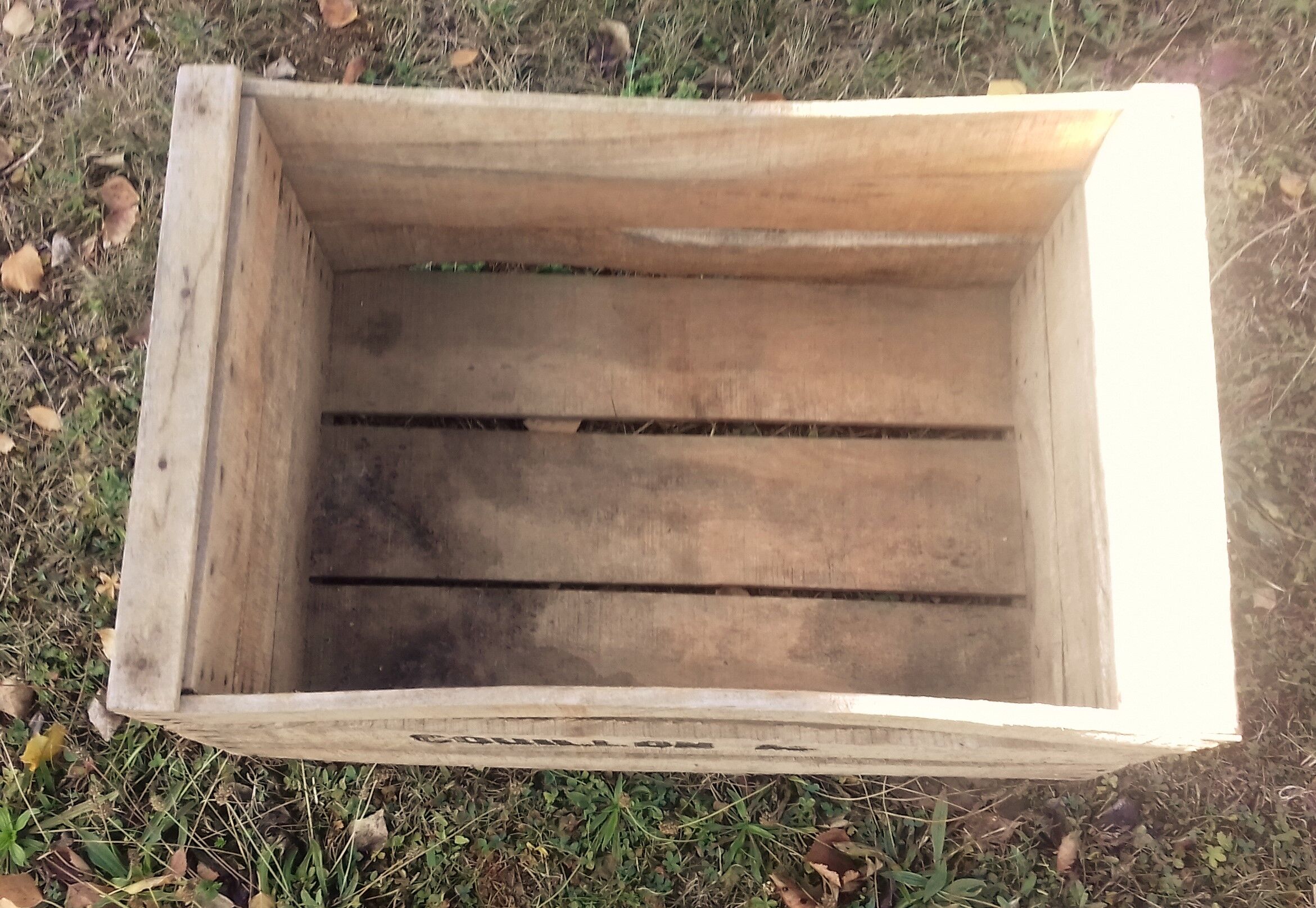 Wooden box with black letters