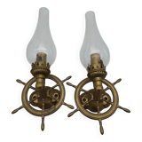 Brass wall sconces with nautical decor