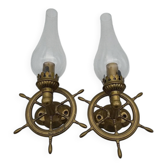 Brass wall sconces with nautical decor