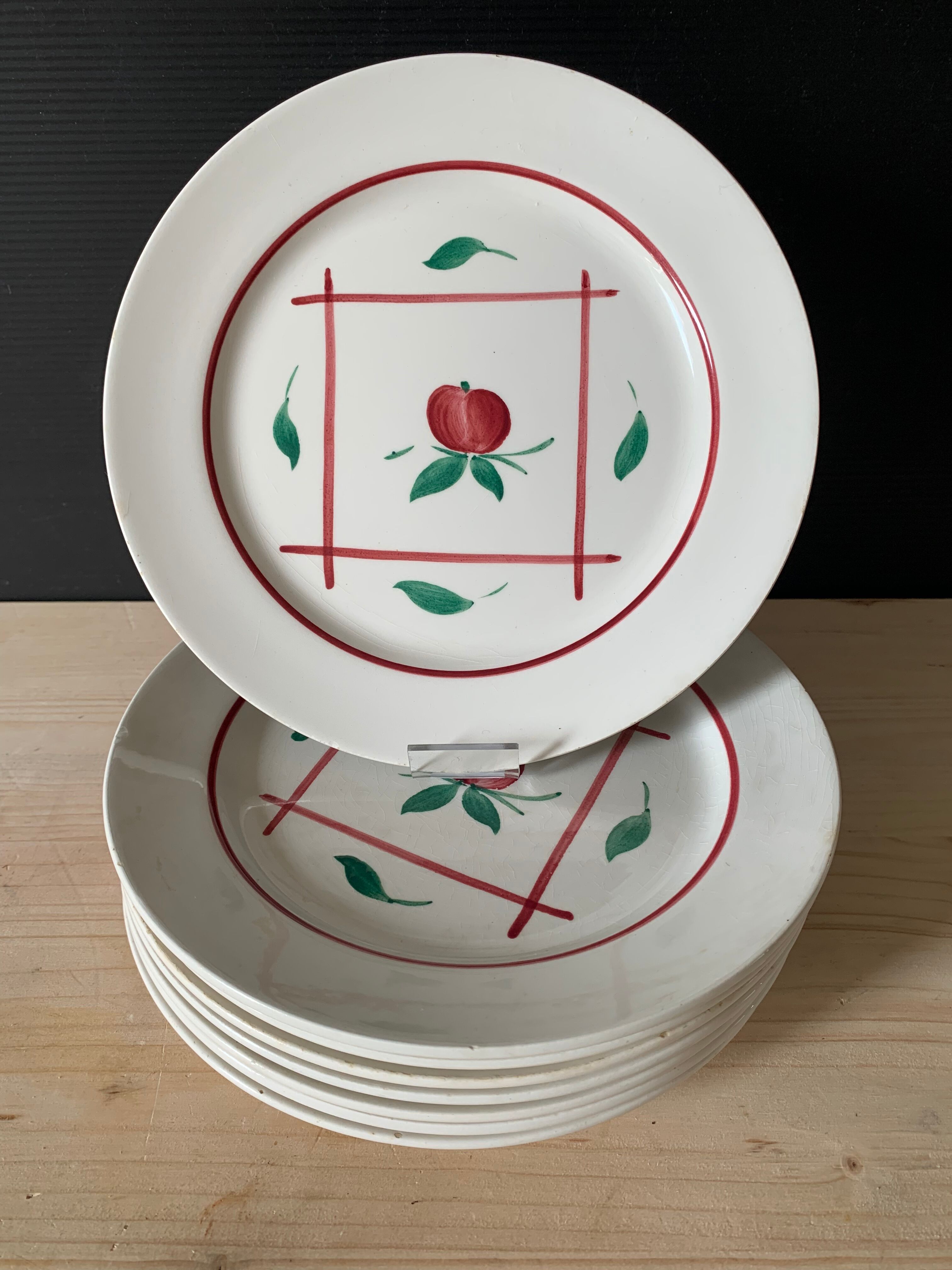 8 plates in faience