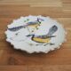 Old hand-painted ceramic plate: blue jays