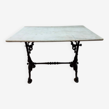 bistro table with cast iron base and marble top