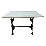 bistro table with cast iron base and marble top