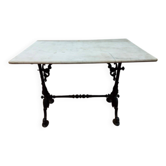 bistro table with cast iron base and marble top