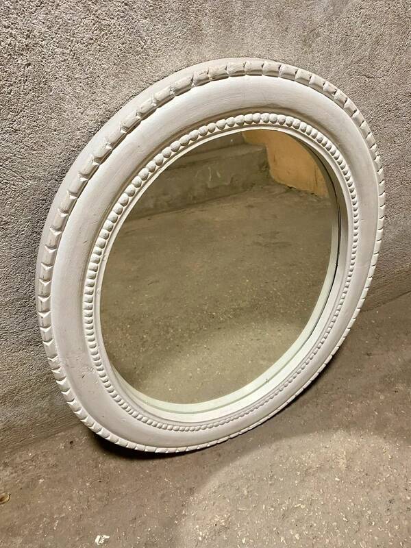 Oval white mirror
