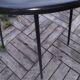 Black metal table compass feet