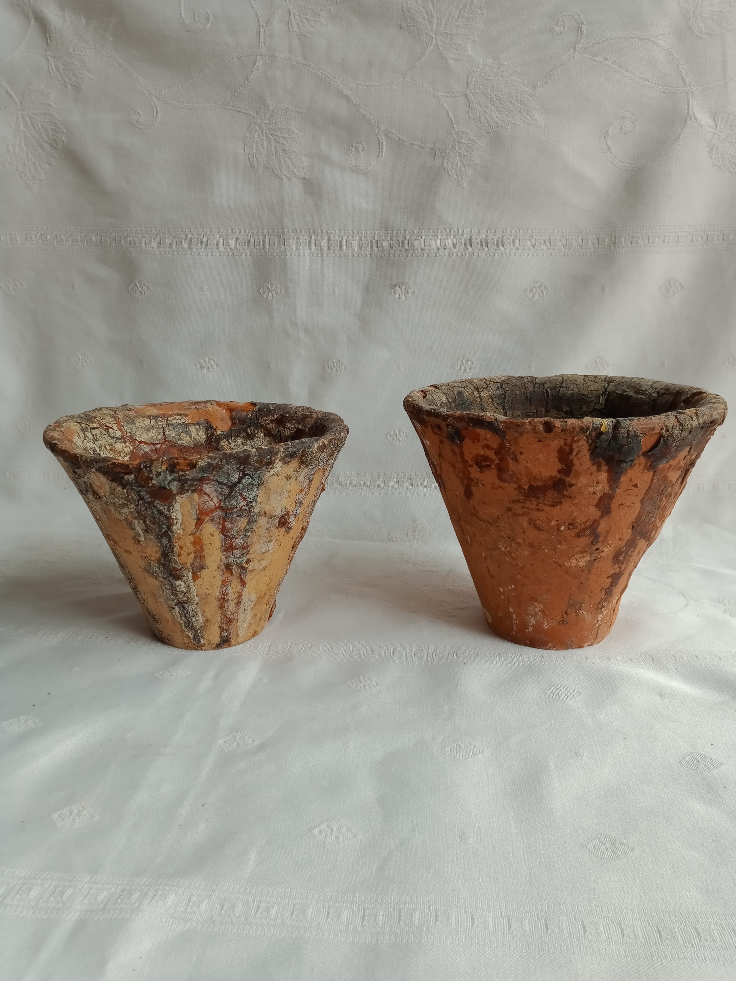 Old terracotta sap pots