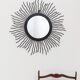 Black metal sunburst wall mirror, round 63x63 cm, vintage 1990s, made in Italy