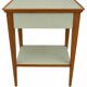 Small vintage table in sage green wood.