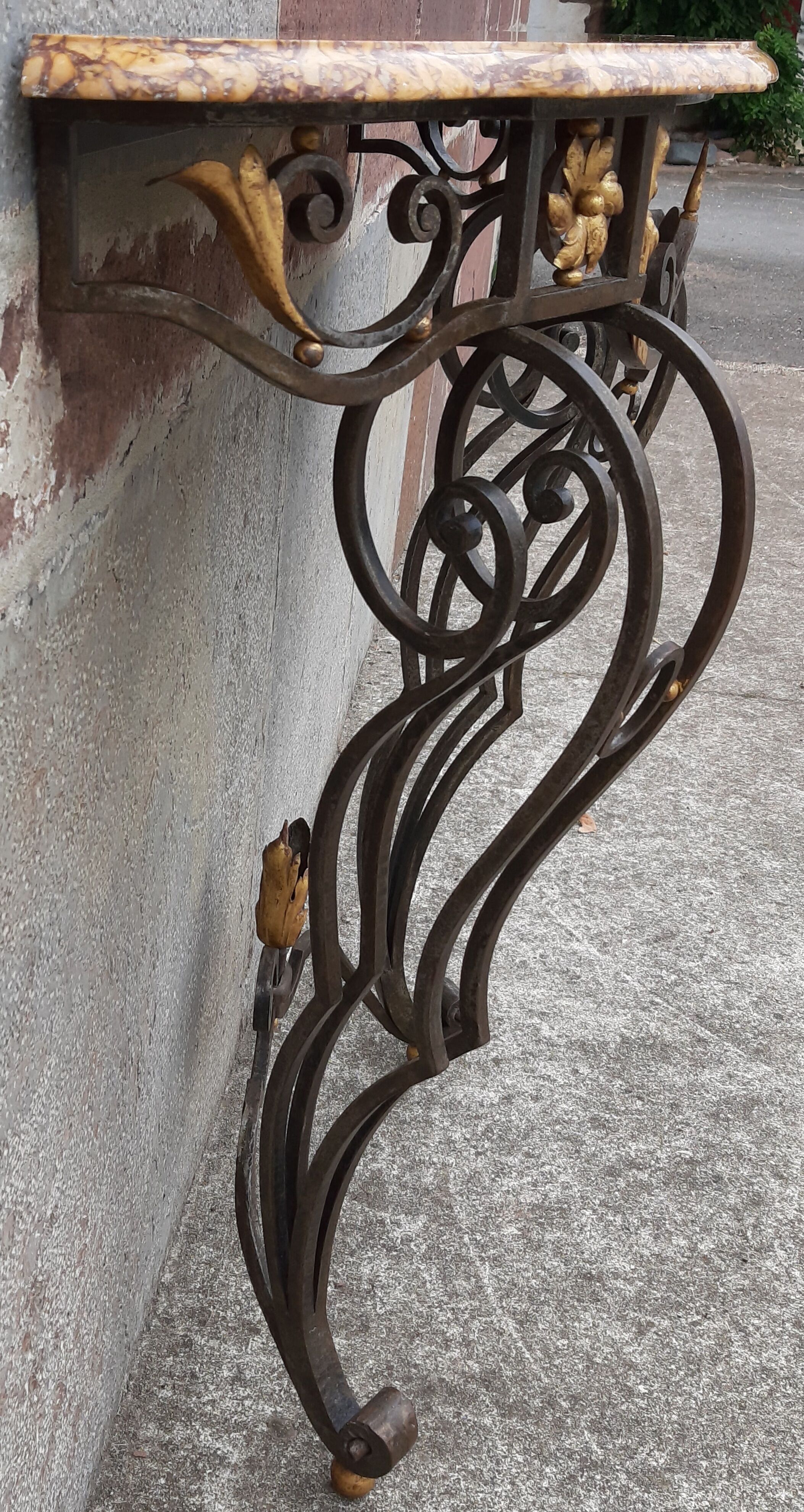 Console forged foot marble top