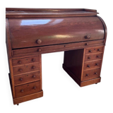 Beautiful vintage 20th-century American cylinder desk and its chair.