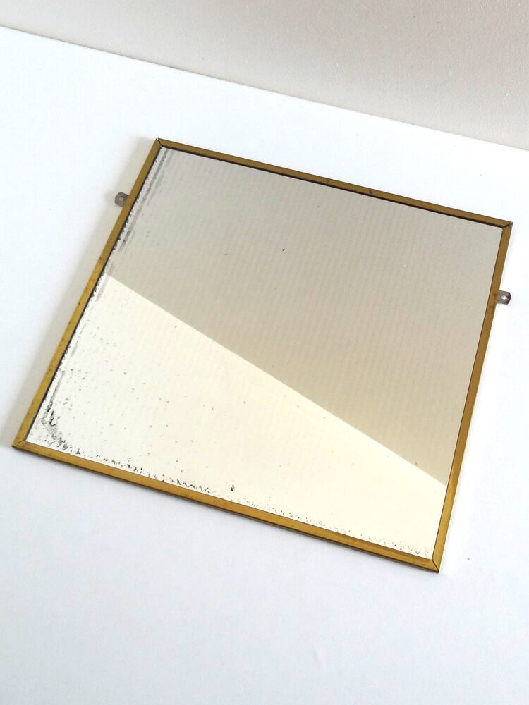 Miroir en métal doré 36 x 34 cm