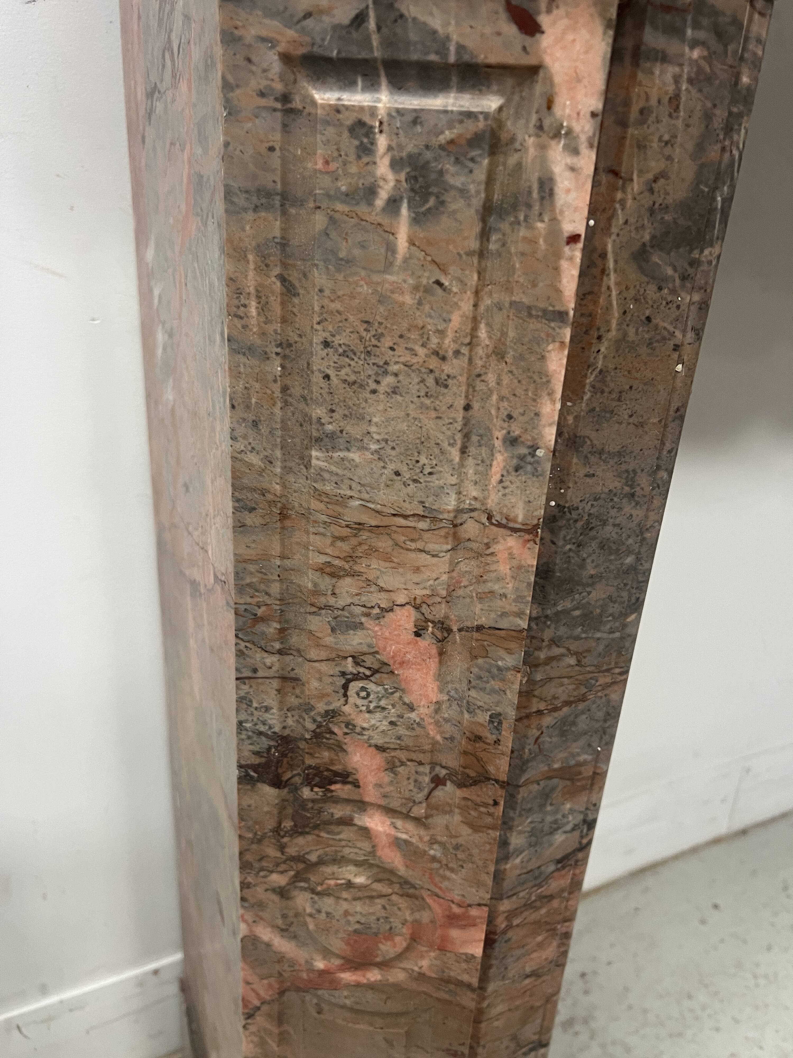 Louis XV style fireplace, "Pompadour" model, grey-pink marble, 20th century