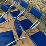 Set of 6 blue chairs with design curves