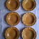6 ochre deep plates from the Faïencerie de Haute Provence.