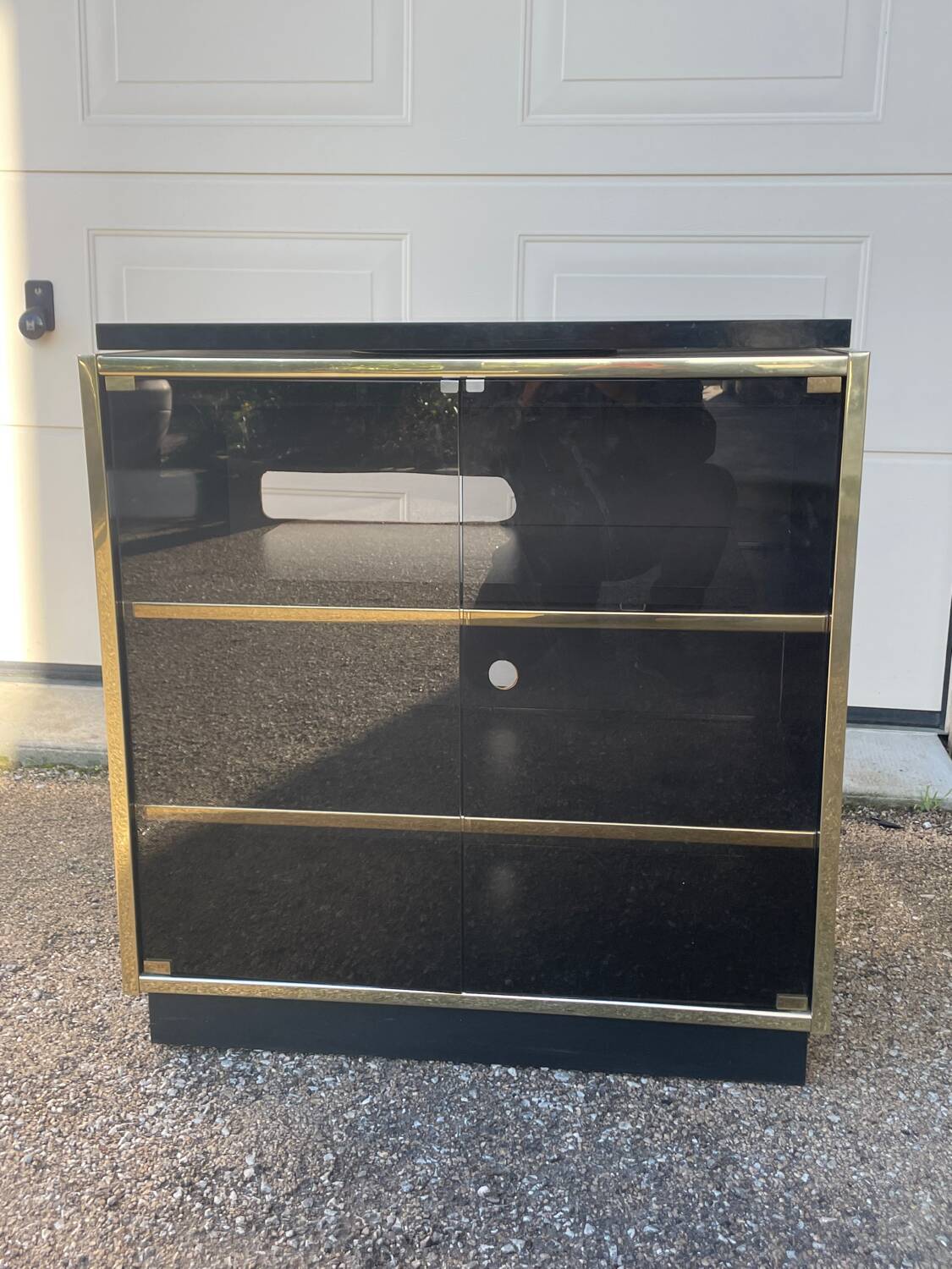 Vintage black and gold TV cabinet from the 70s/80s