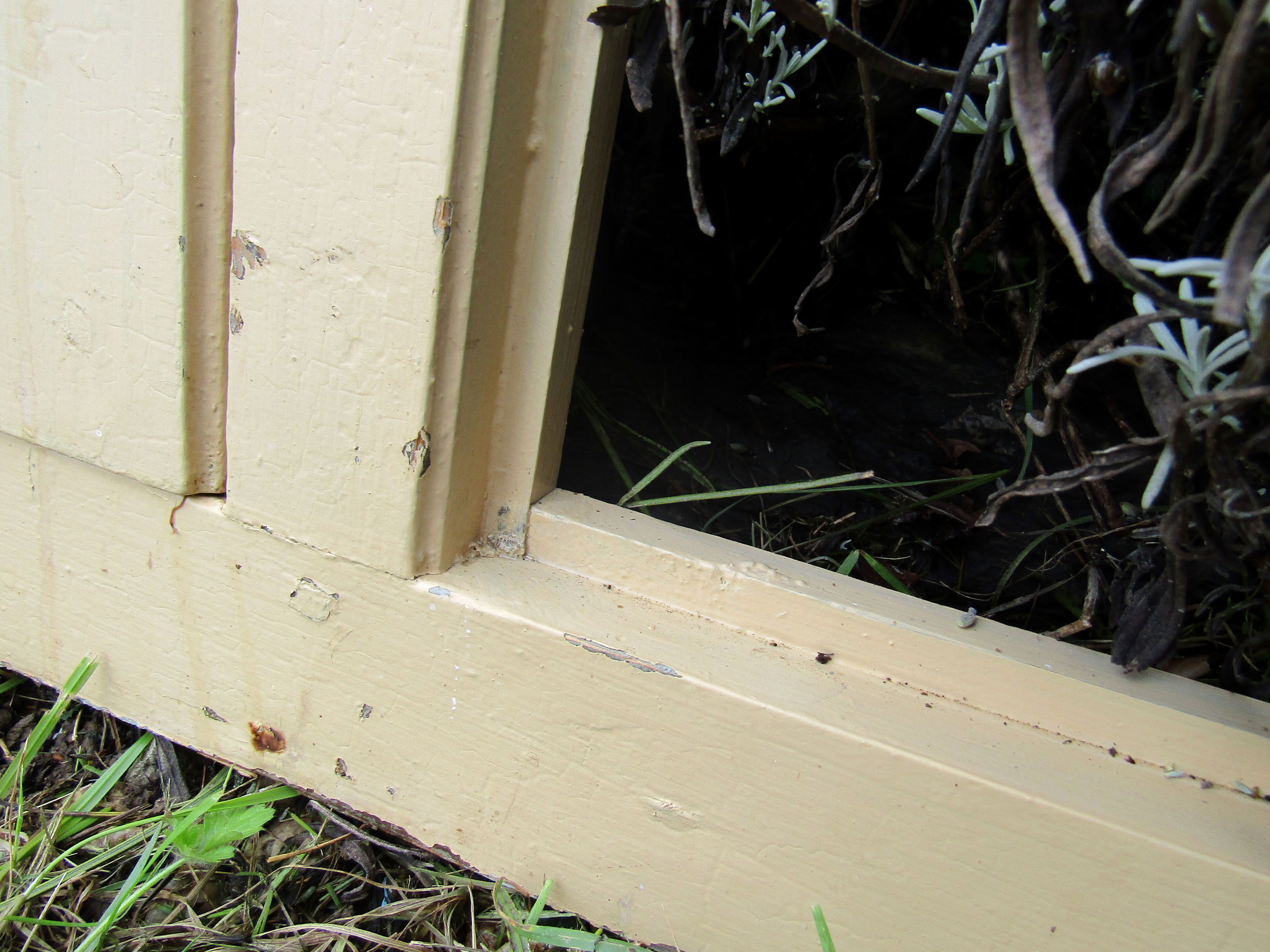old façade of beige cupboards