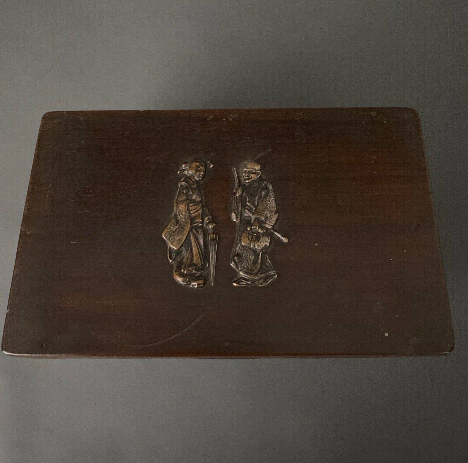 Two reel spools in their original 1900 box