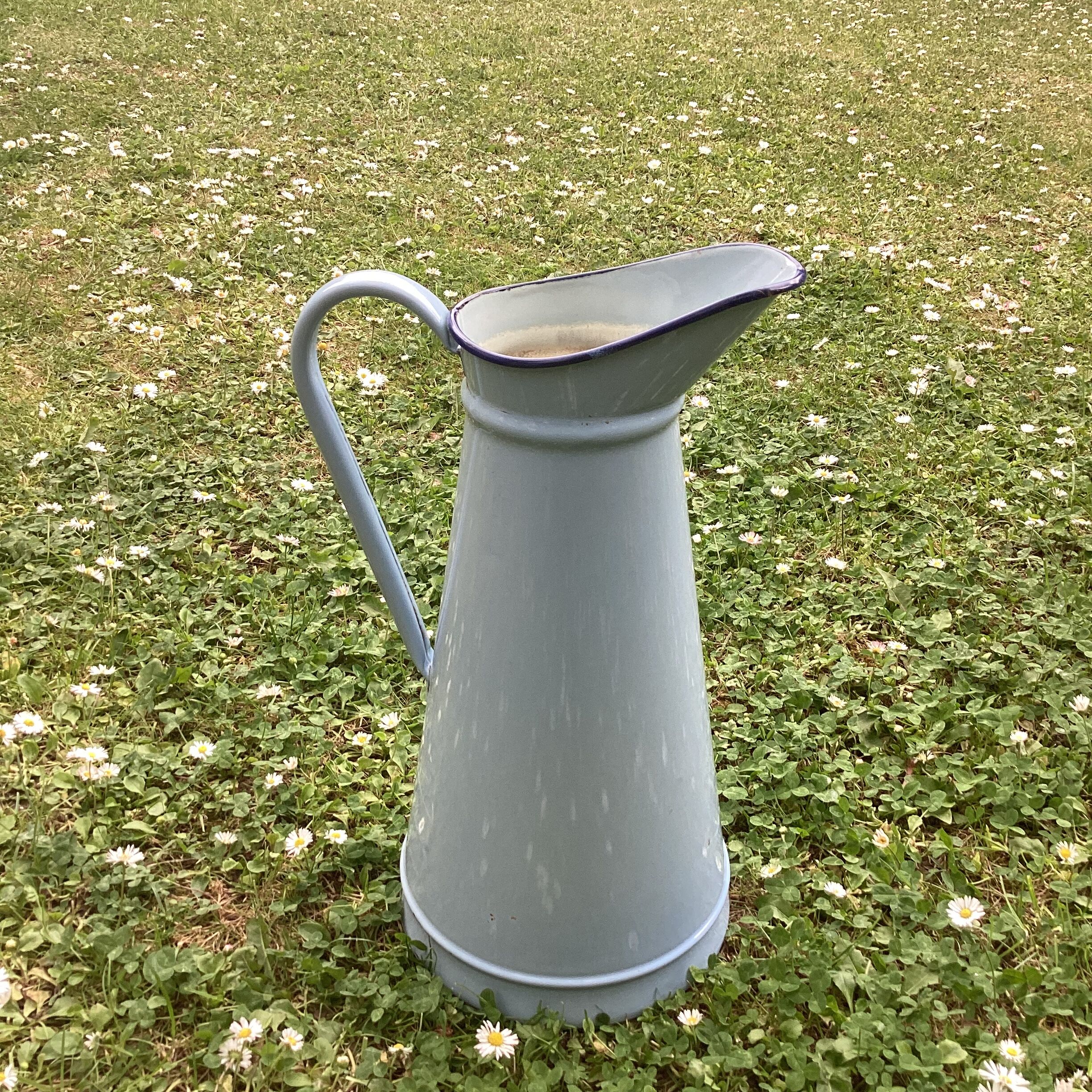 Old broc in enamelled sheet metal light blue color