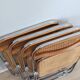Set de 4 chaises Plia en bois et paille de Vienne par Castelli des années 1970.