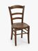 Antique wooden chair with a pyrographed shell motif seat.