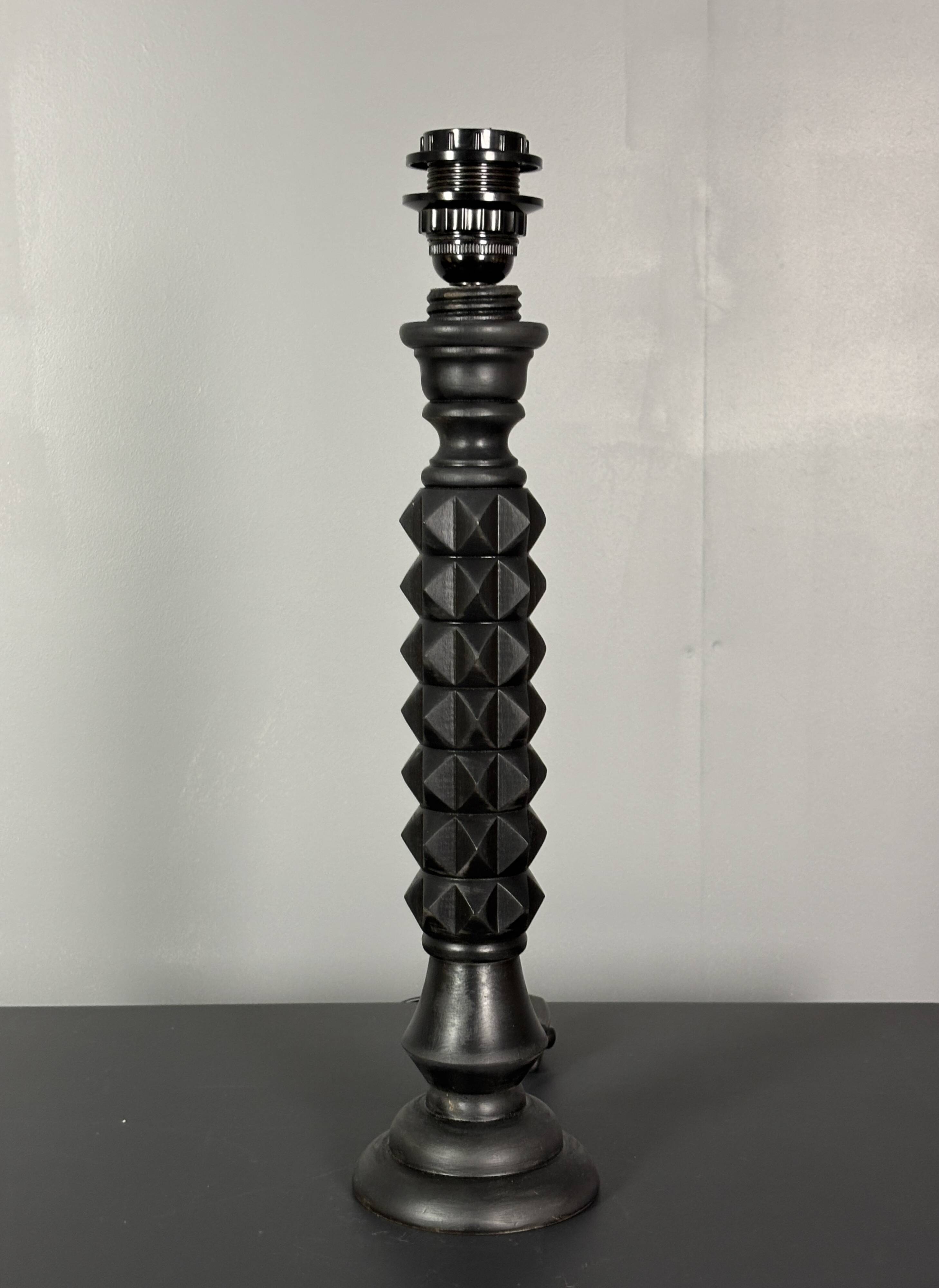 Brutalist wood turned ebonized table lamp in the style of Charles Dudouyt