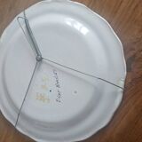 Plat décoratif en faïence française à décor d’oiseau décor Moustiers