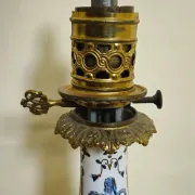 Gien: pair of antique oil lamps in fine earthenware richly decorated.