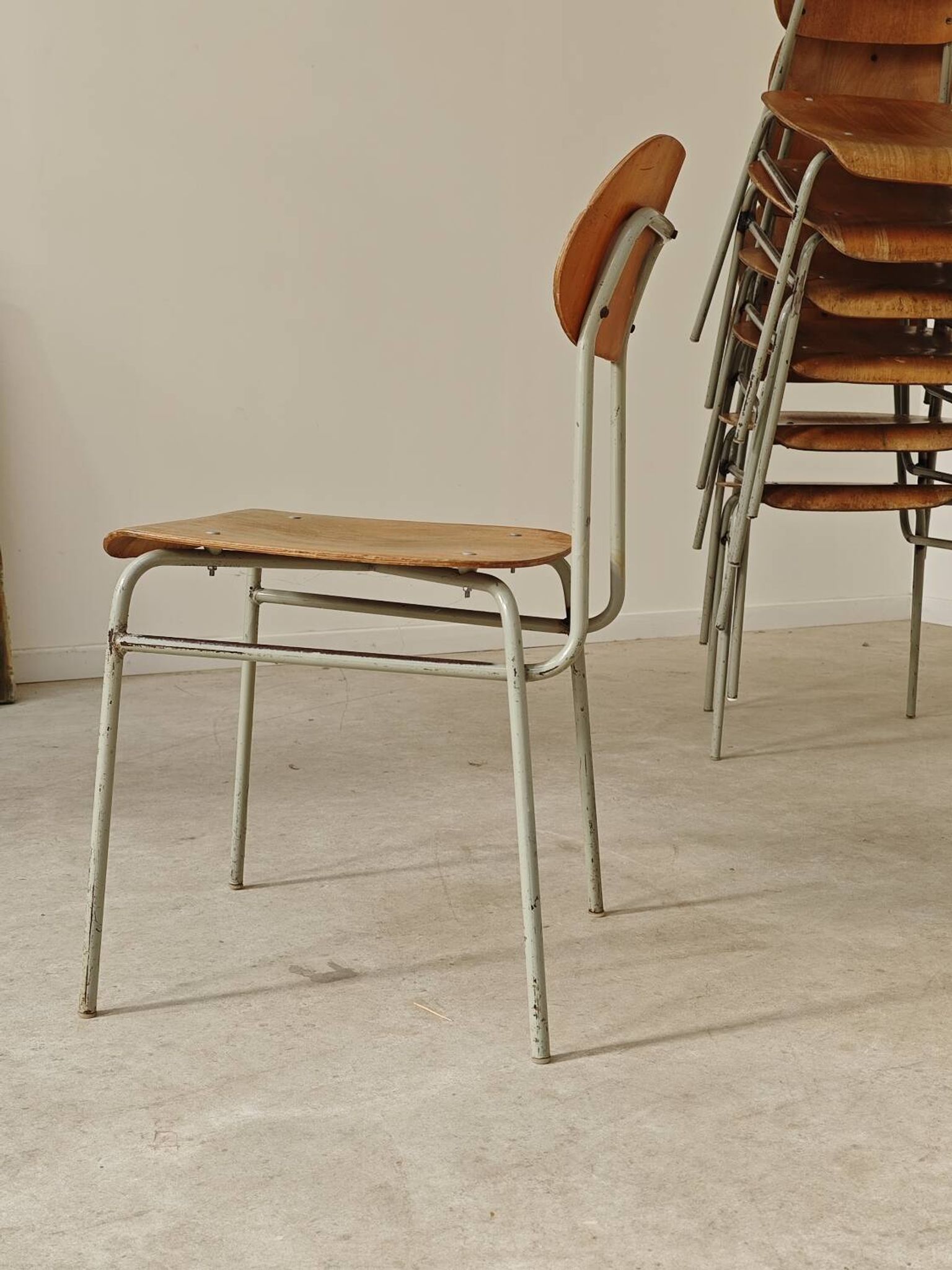 Set of 8 metal and wood school chairs  
Ex Czechoslovakia 1960