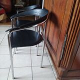 Pair of black and chrome leather Italian armchairs