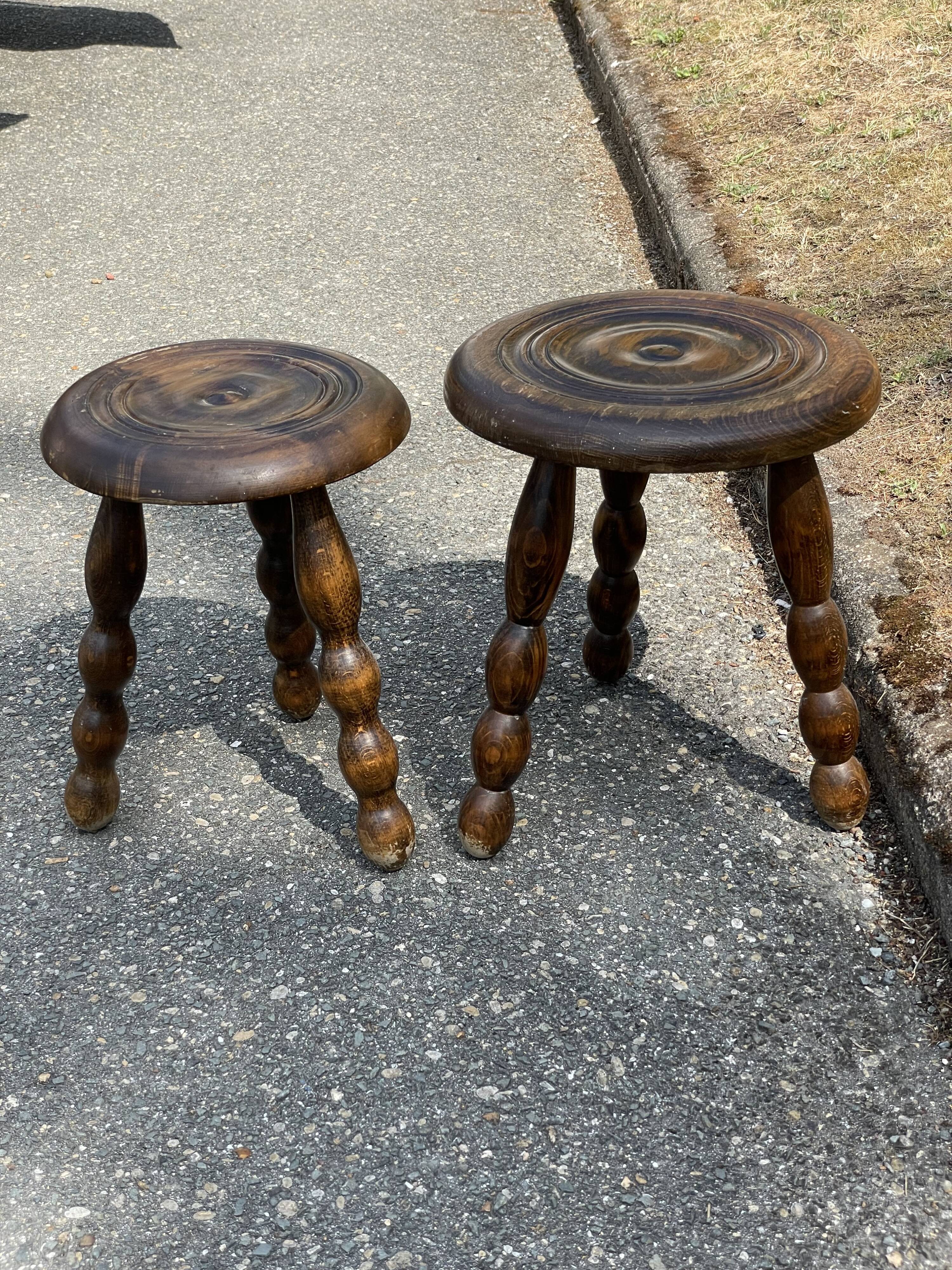 Duo of tripod oak stools
