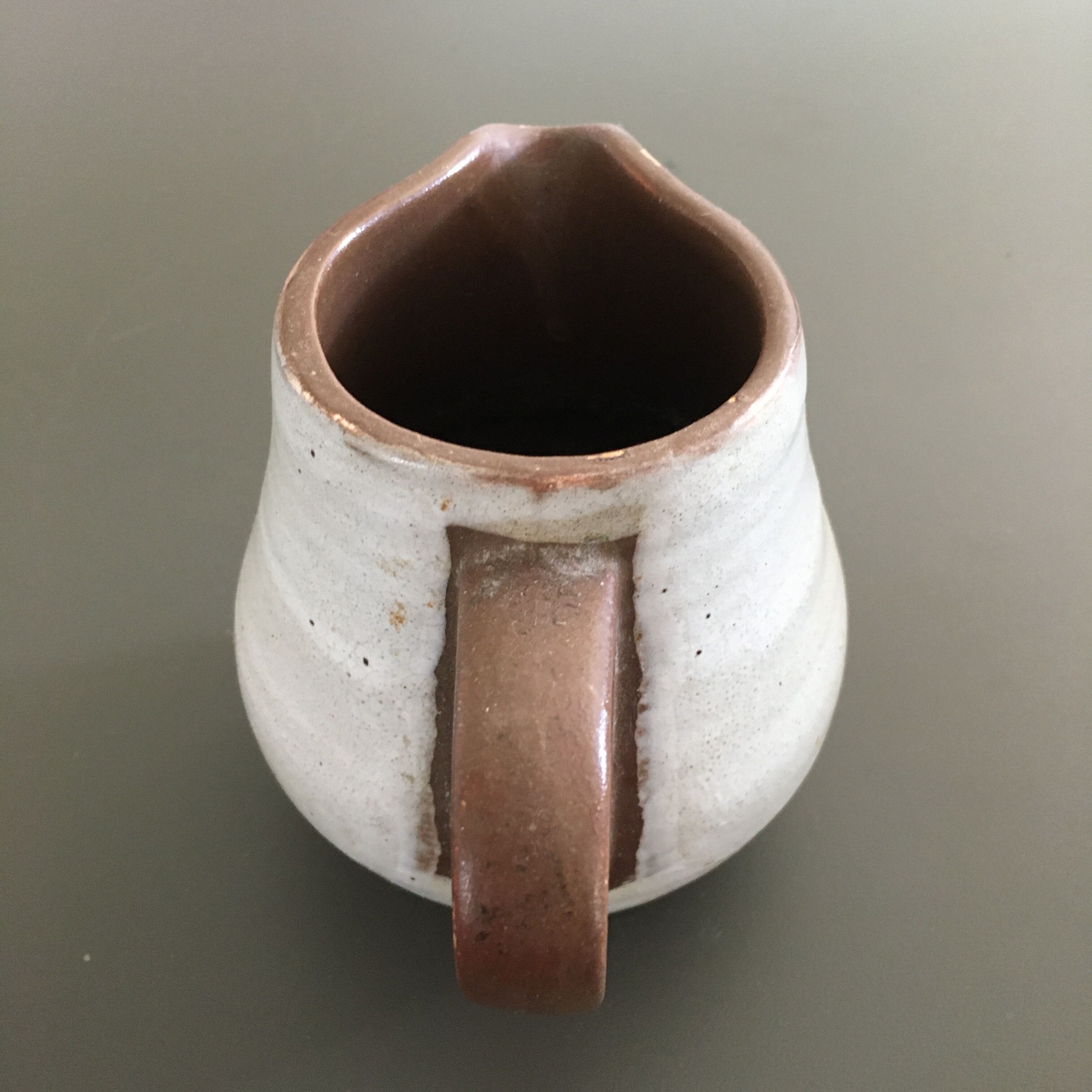 Pitcher patinated ivory sandstone