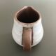 Pitcher patinated ivory sandstone