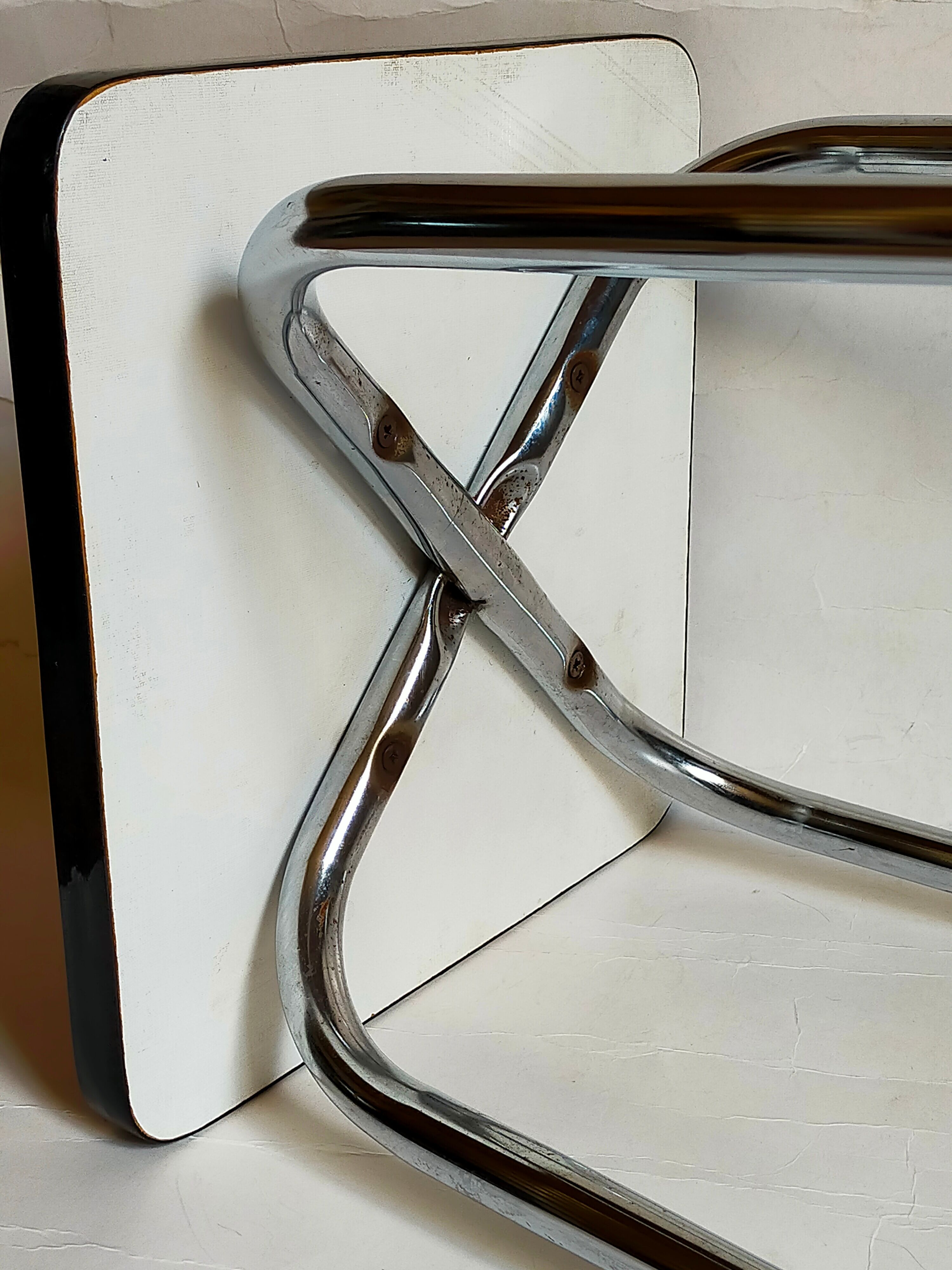 Vintage formica stool with tapered feet