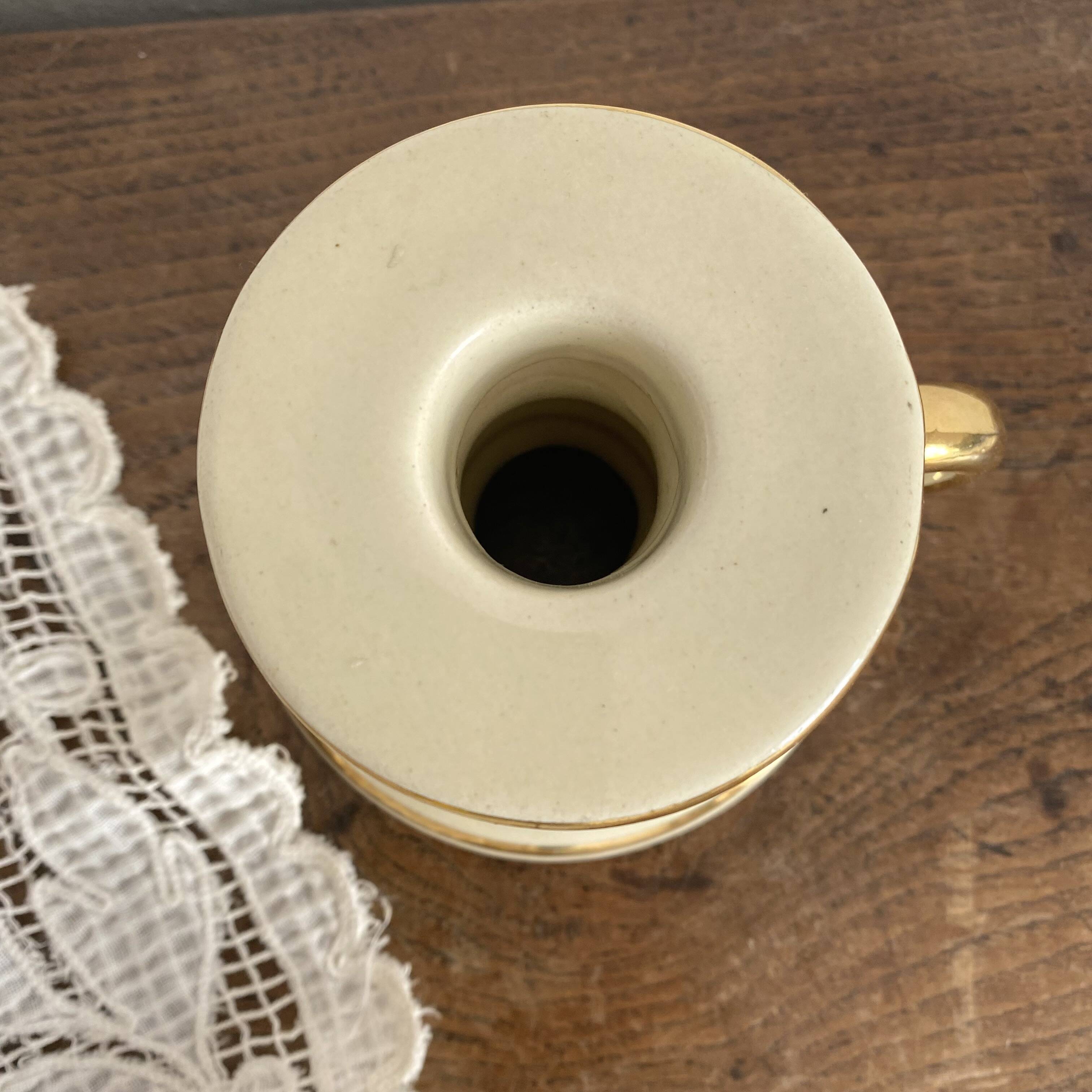 Charming cream and gold thumb candle holder, 1950s