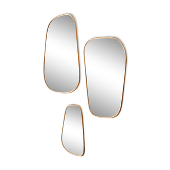 Abstract golden brass mirror