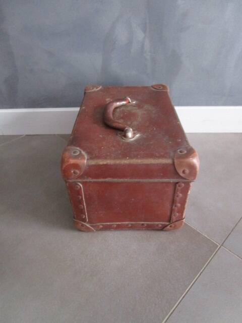 Old cardboard and metal suitcase